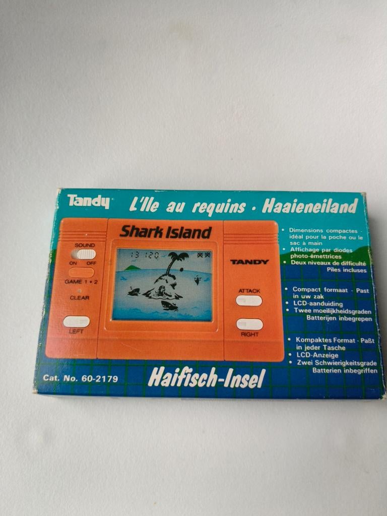 vintage handheld Tandy Shark Island 60-2179 des années 80, Informatique & Logiciels, Ordinateurs Vintage, Enlèvement ou Envoi