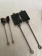 Anciens gaufriers en fonte, Ophalen