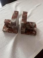 Vintage boekensteun, Enlèvement