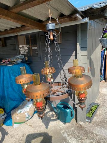 Antieke luster in koper beschikbaar voor biedingen