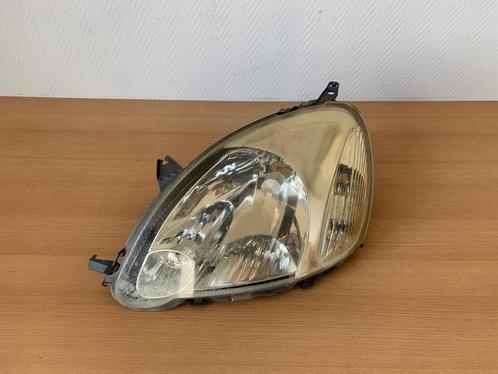 koplamp links toyota yaris I 2003 tot 2005 811500D08000, Auto-onderdelen, Verlichting, Toyota, Gebruikt, Ophalen of Verzenden
