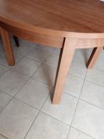 Houten  ronde  tafel, Ophalen