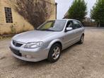 Mazda 323f 1.6i benzine 148dkm met keuring, Auto's, Voorwielaandrijving, Stof, 139 g/km, 4 cilinders