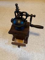 Antieke koffiemolen, Ophalen