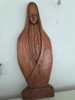 houten sculpturen, Ophalen