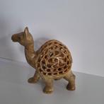 Dromedaris met baby in  buik, Ophalen