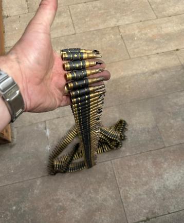7,62x51 FN - MAG patroonband / hulzen  beschikbaar voor biedingen
