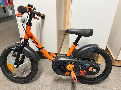 Kinderfiets B’Twin 14 inch – Oranje – met/zonder zijwieltjes, Fietsen en Brommers, Fietsen | Kinderfietsjes, Zo goed als nieuw