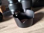 Zonnekap hb 34 nikon spiegelreflexcamera, Ophalen
