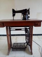 Oude Singer naaimachine, Ophalen