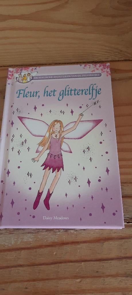 Boek Fleur het glitterelfje, Ophalen of Verzenden, Zo goed als nieuw, Daisy Meadows