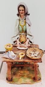 Figurine femme Ambrogio Massidda, Enlèvement