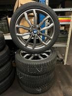 Originele winterset Bmw 1-serie F40, Ophalen, 18 inch, Gebruikt, Banden en Velgen