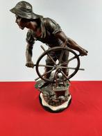 Statue en bronze patiné Xavier Raphanel « Le Pilote », Bronze, Enlèvement ou Envoi