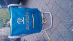 Een  rug trektas voor  dragen van baby, Ophalen