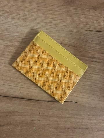Gele ledere portomonee van goyard beschikbaar voor biedingen