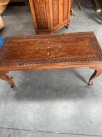 Salontafel, Ophalen