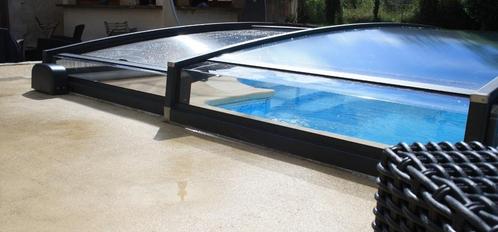 Abri piscine motorisé solaire bas, Jardin & Terrasse, Accessoires de piscine, Neuf, Couverture de piscine, Enlèvement ou Envoi