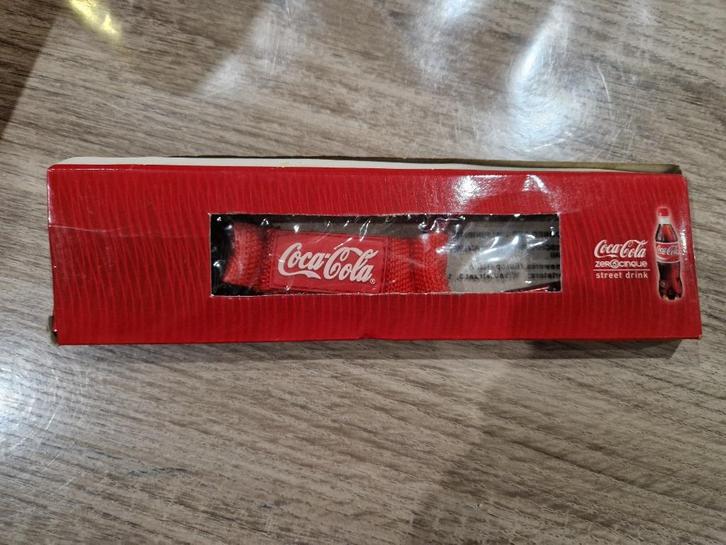 De flessenhouder van Coca-Cola is afkomstig van het 1st Coca, Verzamelen, Merken en Reclamevoorwerpen, Nieuw, Overige typen, Ophalen of Verzenden