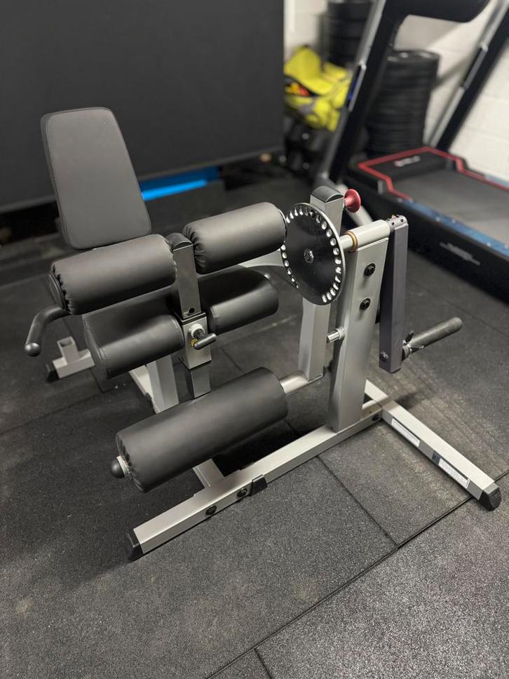 Body solid combo leg, Sports & Fitness, Équipement de fitness, Utilisé, Plaques d'haltères, Enlèvement