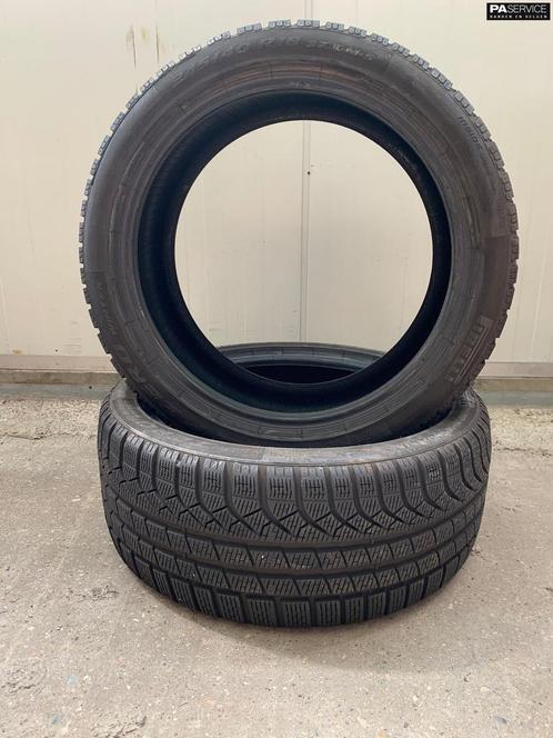 2x Pirelli 245 45 18 Winterbanden met 6.4 mm, Auto-onderdelen, Banden en Velgen, Banden en Velgen, Winterbanden, 18 inch, 245 mm