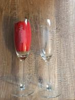 2 champagneglazen “Zot van A”., Ophalen, Nieuw
