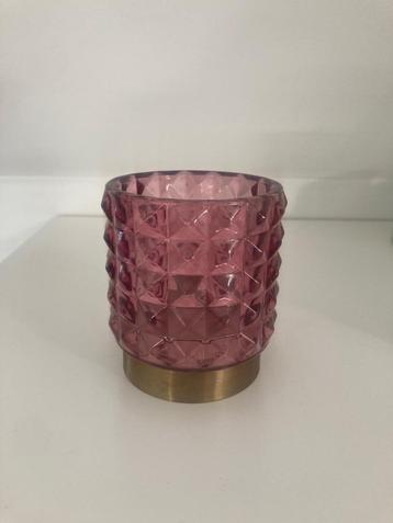 Roze theelicht beschikbaar voor biedingen