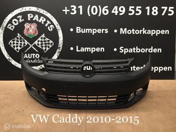 VW Caddy voorbumper met grill 2010-2015 origineel