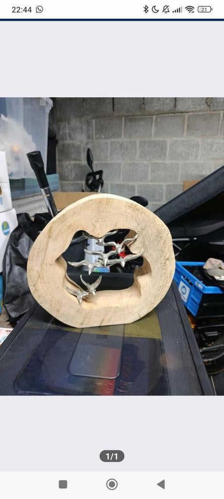 Houten beeld vogels, Ophalen