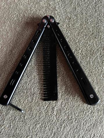 Comb-like butterfly knife. Practice Blade- Stainless Steel- beschikbaar voor biedingen