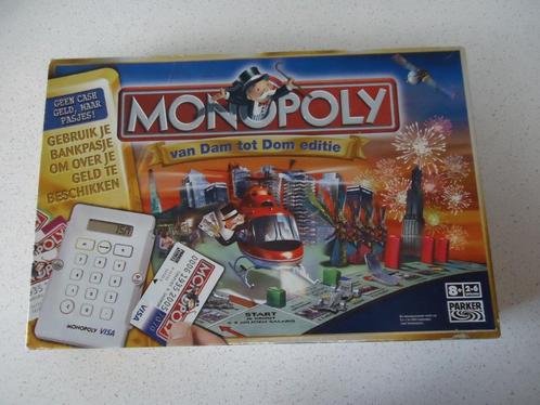 "Monopoly Van Dam Tot Dom" van Parker in prima staat !, Hobby en Vrije tijd, Gezelschapsspellen | Bordspellen, Gebruikt, Een of twee spelers
