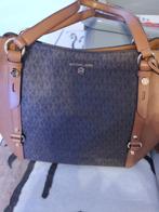 Sac Mickaël Kors, Enlèvement