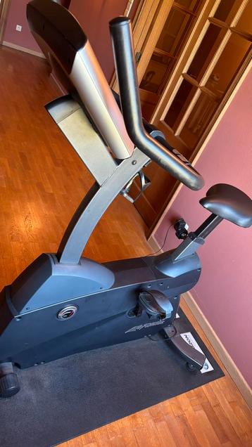 Home trainer Life Fitness C1, Jambes, Comme neuf, Enlèvement, Vélo d'appartement