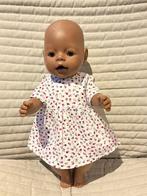 342. Babyborn : Nieuw jurkje met roze en paarse bloemetjes, Kinderen en Baby's, Speelgoed | Poppen, Ophalen of Verzenden, Nieuw