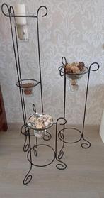 smeedijzeren staanders, Ophalen