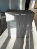 Lage bureau kasten, Ophalen