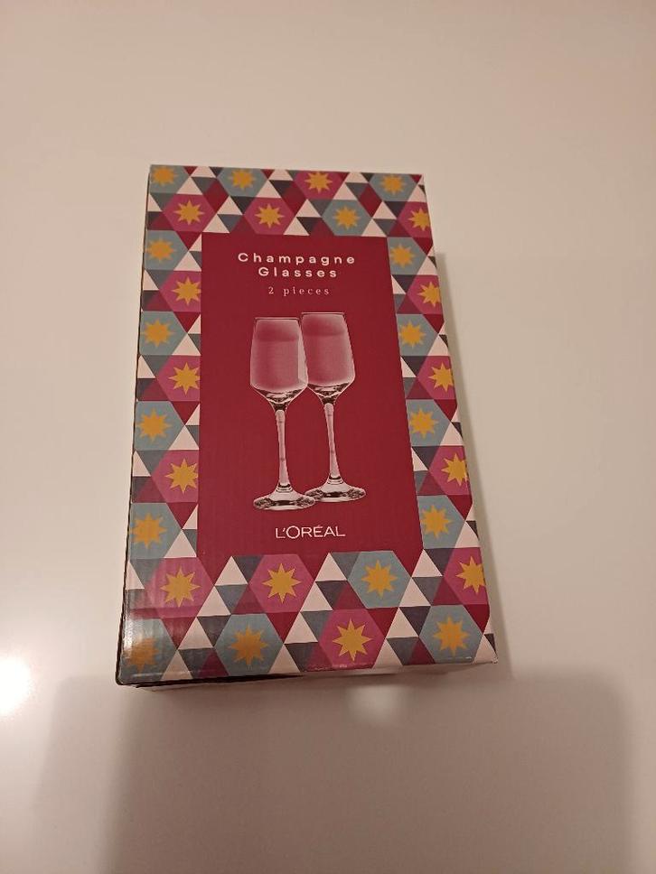 NIEUW 2 champagne glazen l'Oréal, Verzamelen, Glas en Drinkglazen, Nieuw, Overige typen, Ophalen of Verzenden