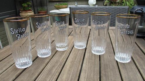 8 Stella Artois glazen ribbeltjes met goudrand, Collections, Verres & Petits Verres, Utilisé, Verre à bière, Enlèvement
