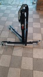 Lève moto centrale, Enlèvement