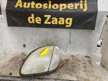 Koplamp links van een Mercedes SLK beschikbaar voor biedingen