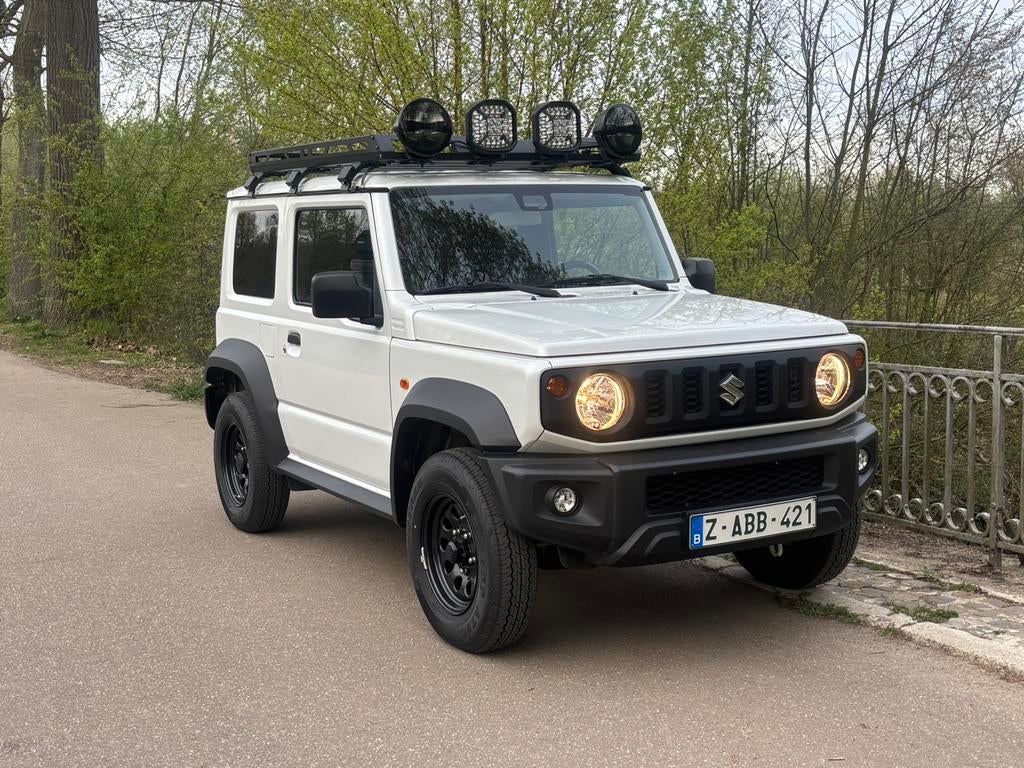 Suzuki Jimny HJ, 2024, 7 jaar garantie, Auto's, Suzuki, 75 kW, 4 cilinders, USB, Wit