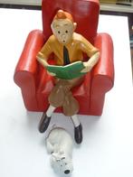 Tintin dans son fauteuil avec milou dans ses pieds, Enlèvement ou Envoi, Tintin