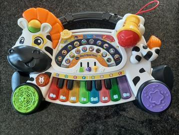 Vtech zing en speel piano disponible aux enchères