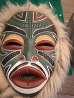 Un masque rare en bois dur en excellent état