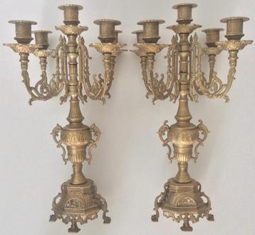 Twee Franse goudkleurige kandelaars beschikbaar voor biedingen