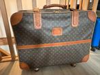 Oude koffer van Louis Vuitton, Ophalen