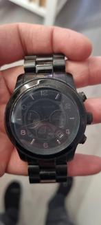 Montre michael kors, Enlèvement