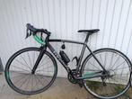 Zwarte koersfiets B-Twin + fietsenstaander + reservewiel, Carbon, Gebruikt, Ophalen