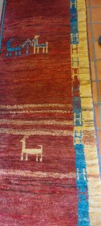 handgeknoopt Perzisch tapijt, Ophalen