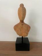Houten beeld, Ophalen
